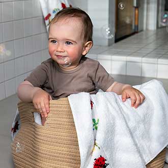 Kategorieheader mit FEILER Baby Badetuch
