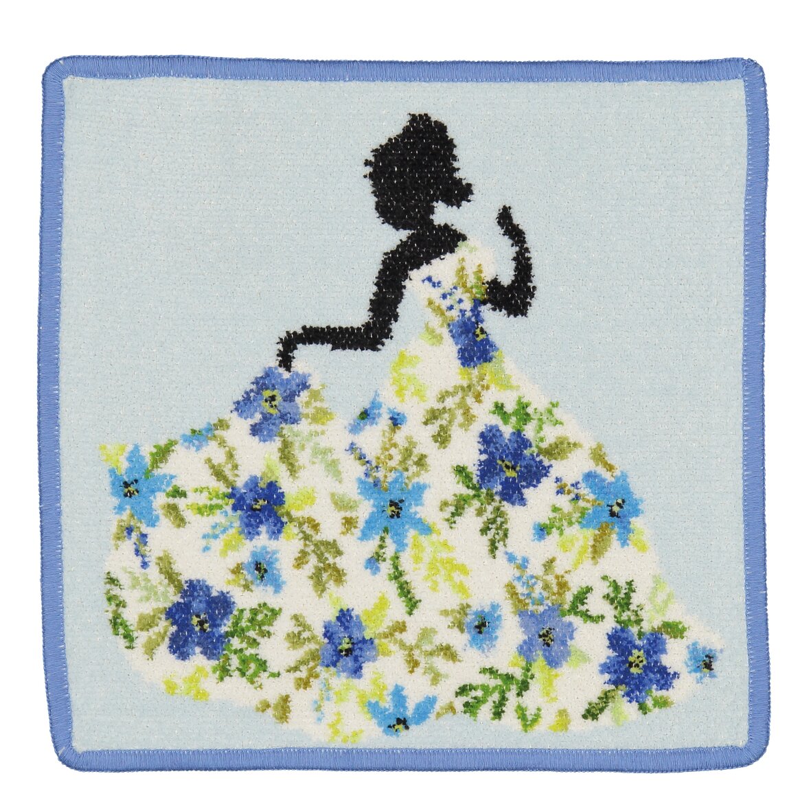 Floral pattern in blue and green on textured fabric with silhouette of a woman. Blue border.