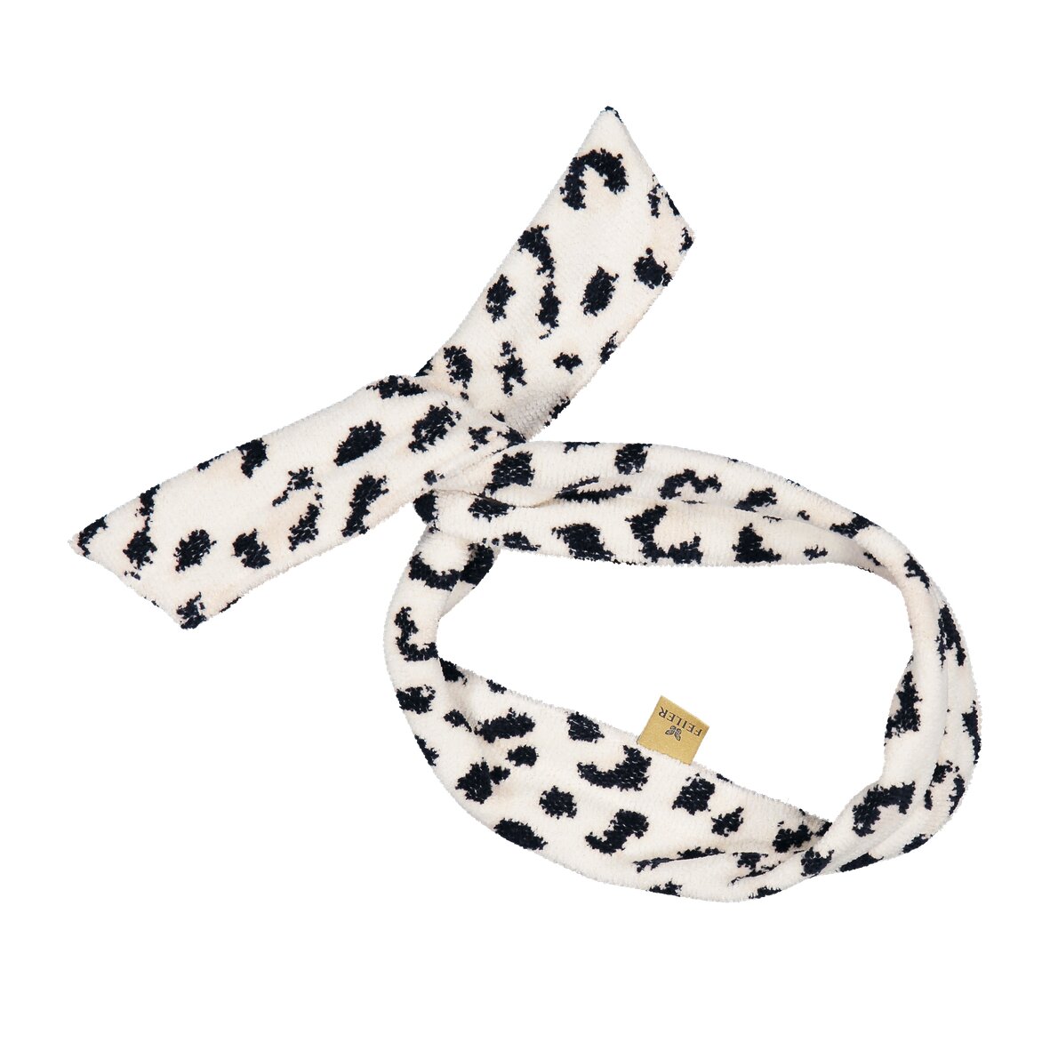 White fabric loops with black abstract patterns, elegant and premium feel.
