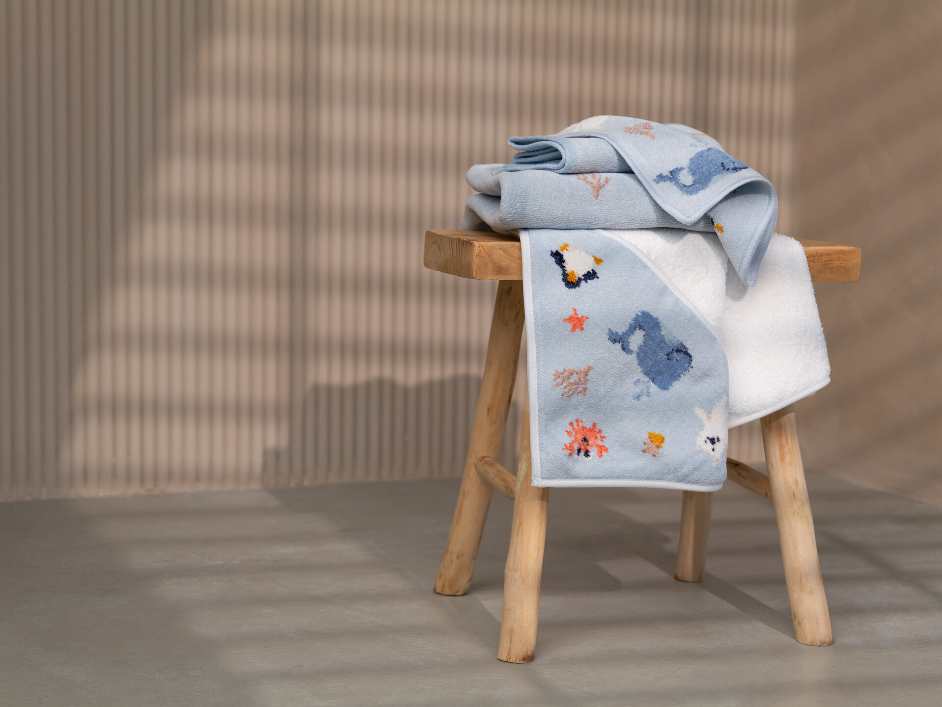 Lifestyle view featuring the FEILER Children’s Hand Towel from the POLAR FRIENDS collection, made from Original FEILER chenille in Germany, lifestyle image.