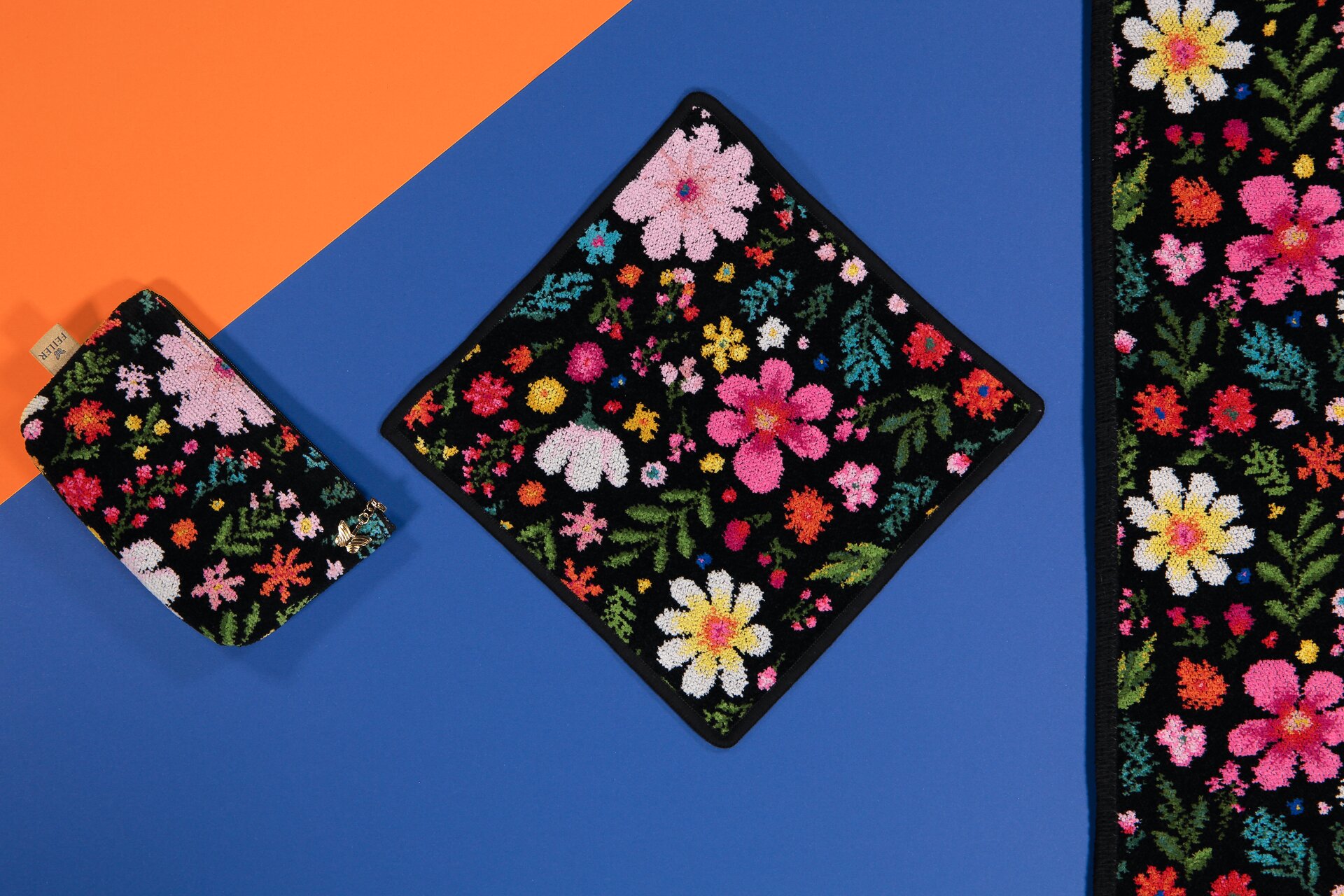Stilvolle Chenille-Set mit floralen Akzenten – Luxuriöses FEILER Handtuch der Kollektion FLOWER POWER als Lifestyleaufnahme aus Original FEILER-Chenille, Made in Germany.