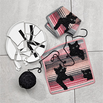 Souvenir-Motiv der FEILER BLACK KITTY Kollektion.