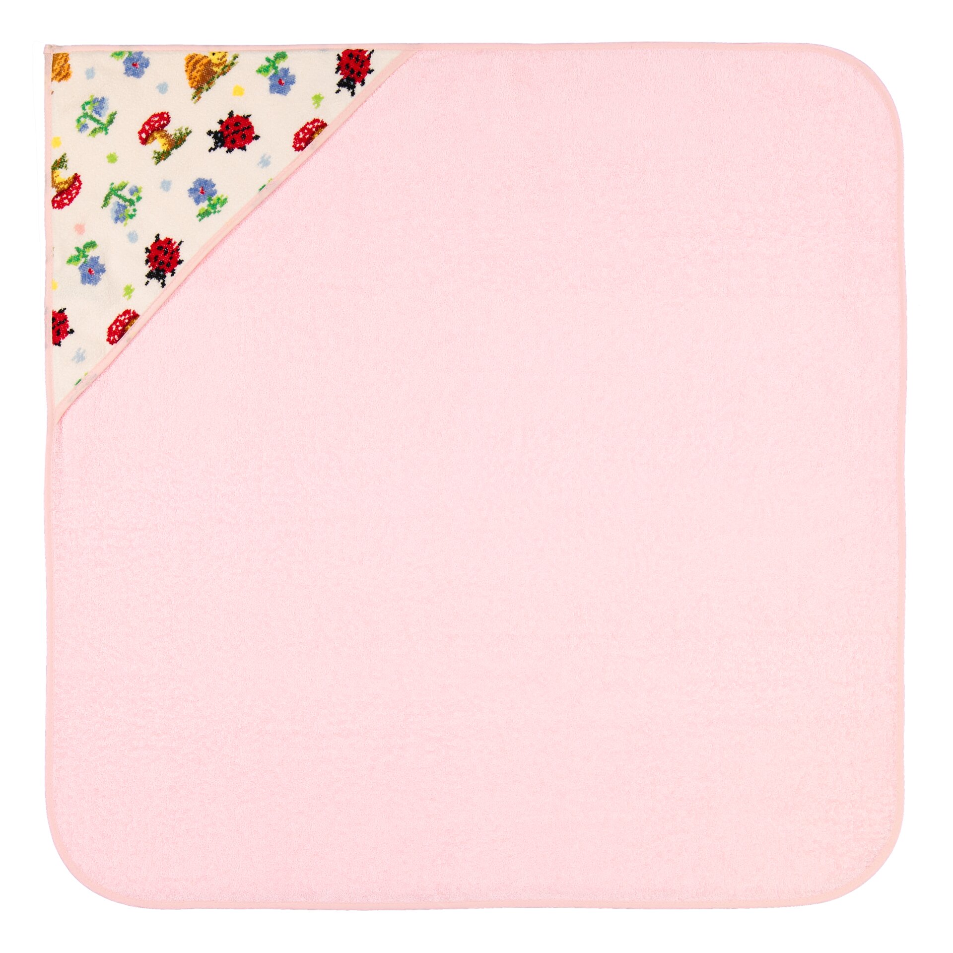 Soft pink square textile with a floral-printed corner. Designed for premium comfort and quality.