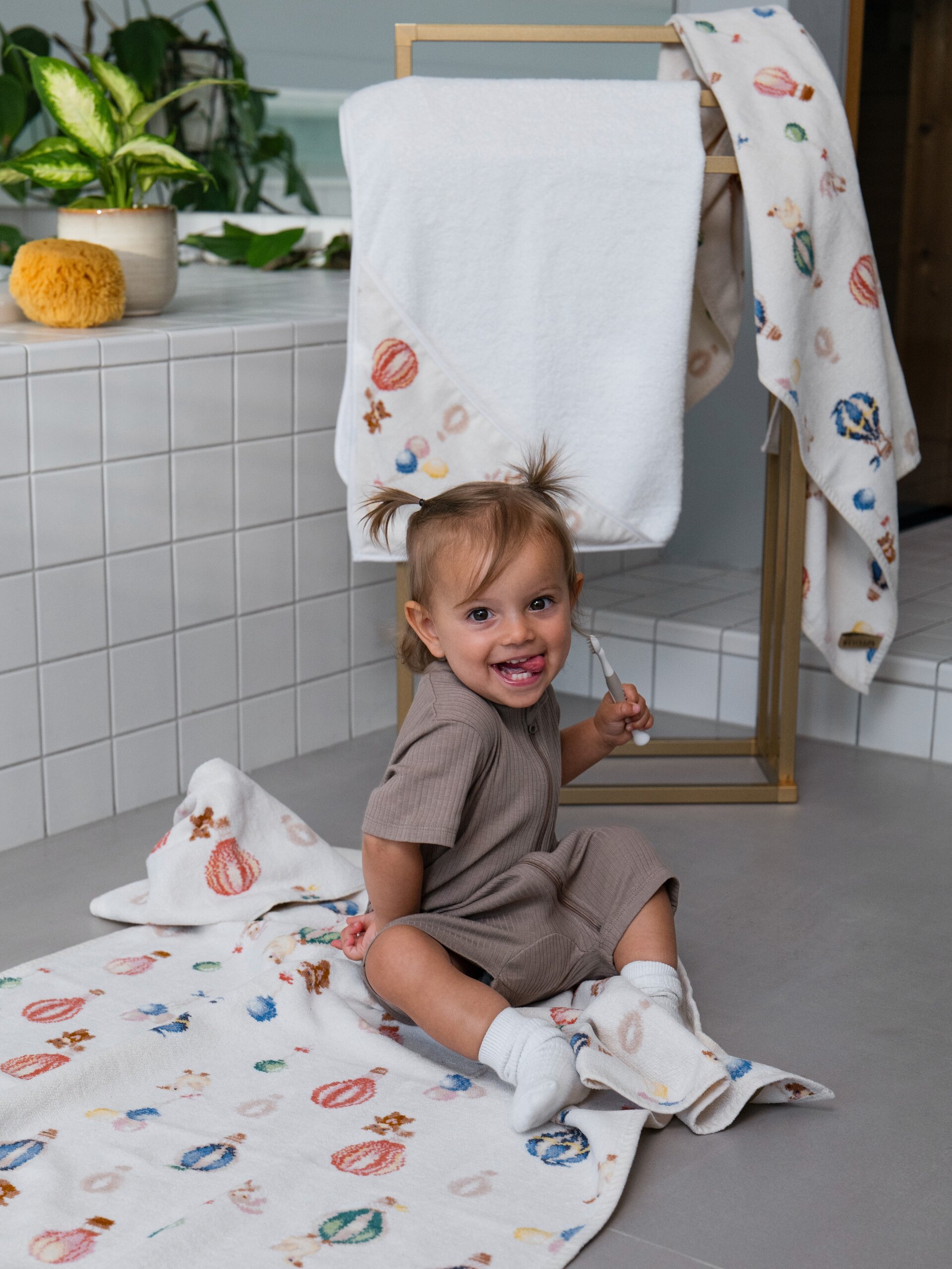 Lifestyle view featuring the FEILER Towel Set from the DREAMY BALLOONS collection, made from Original FEILER chenille in Germany, lifestyle image 2 3 4 5 6 7 8 9 10.