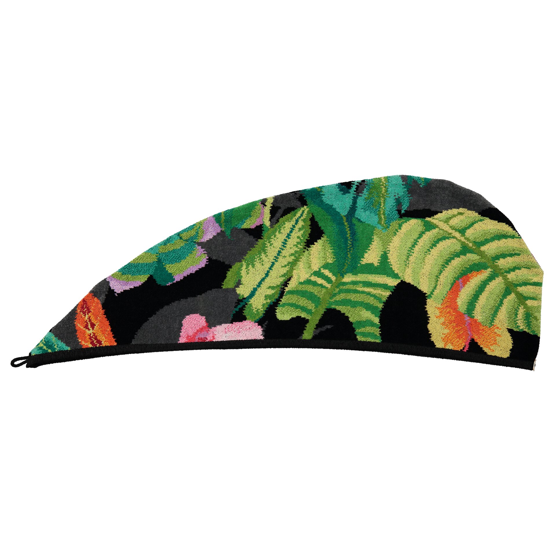 Colorful turban with leaf pattern in green and red on black, product photography.