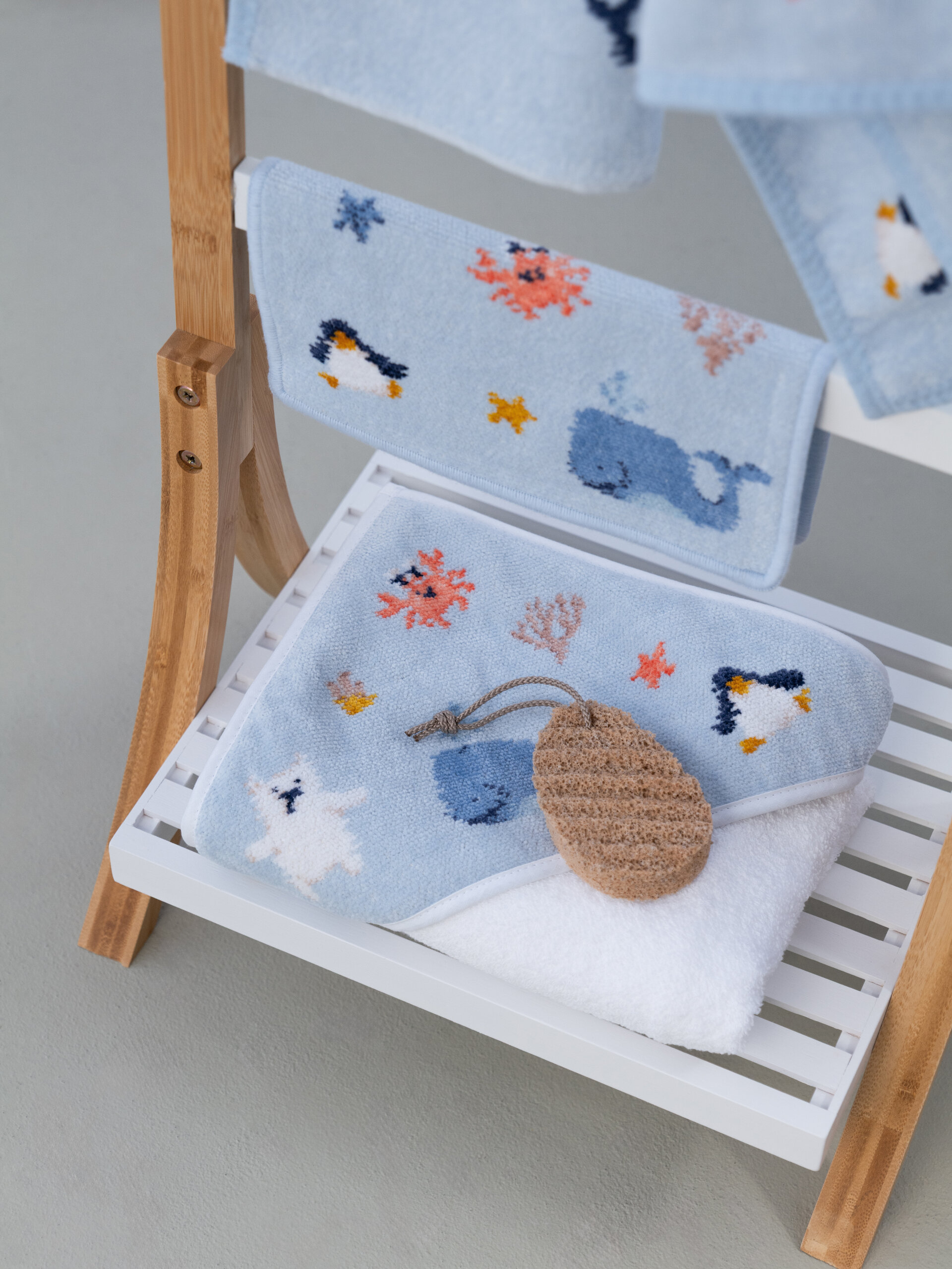 Lifestyle view featuring the FEILER Bath Towel from the POLAR FRIENDS collection, made from Original FEILER chenille in Germany, lifestyle image 2.
