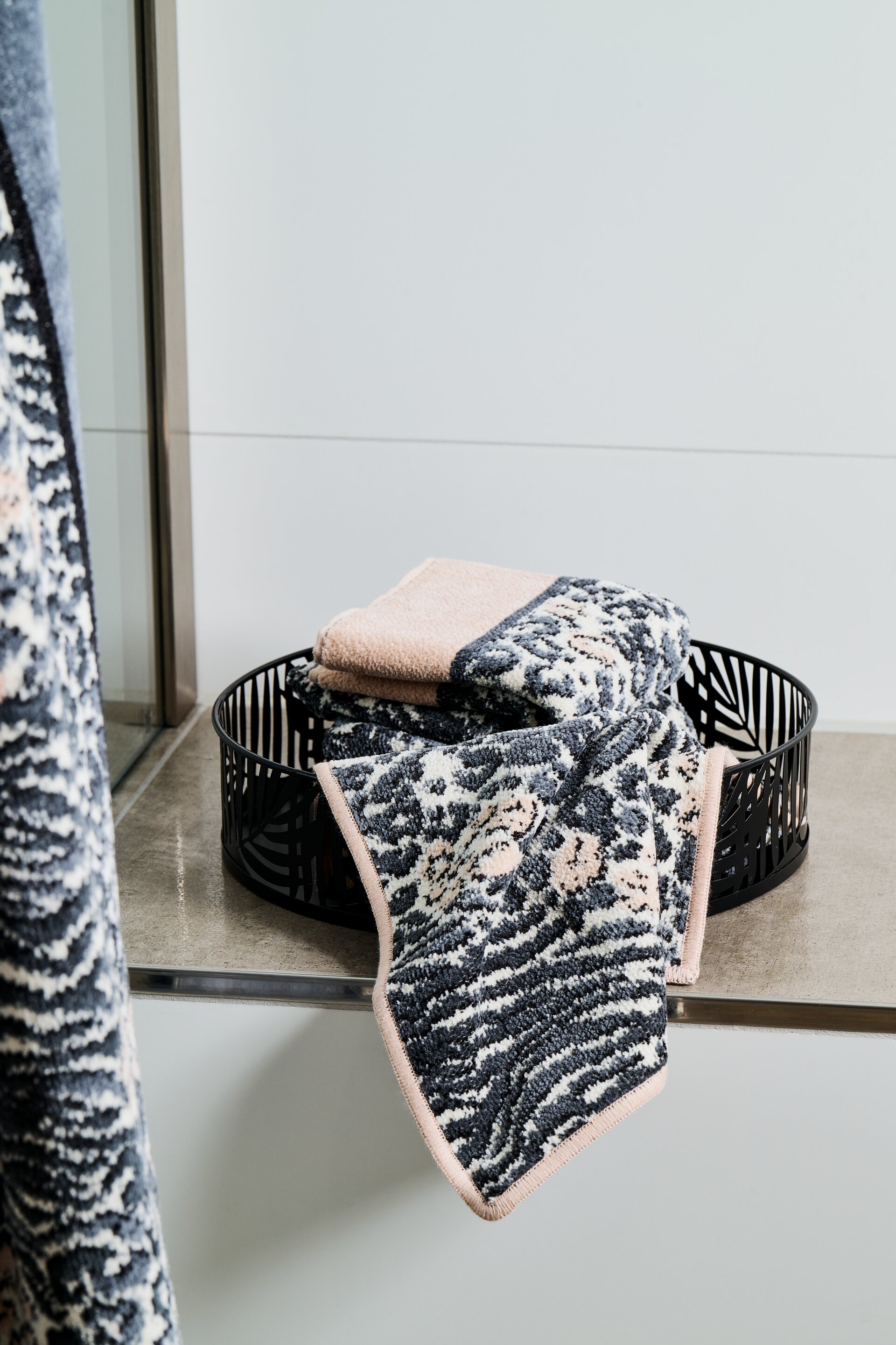 Lifestyle view featuring the FEILER Towel Set from the ANIMAL BLEND collection, made from Original FEILER chenille in Germany, lifestyle image.