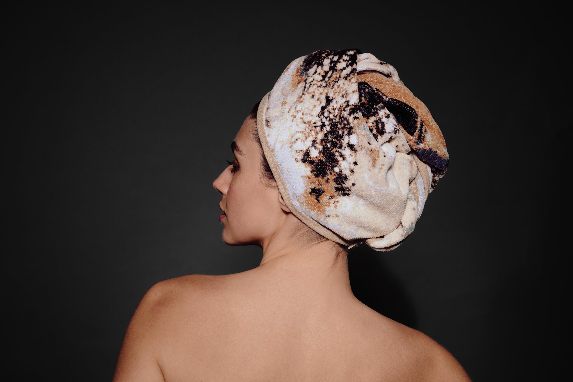 Lifestyle view featuring the FEILER Hand Towel Turban from the PETRICHOR collection, made from Original FEILER chenille in Germany, lifestyle image.