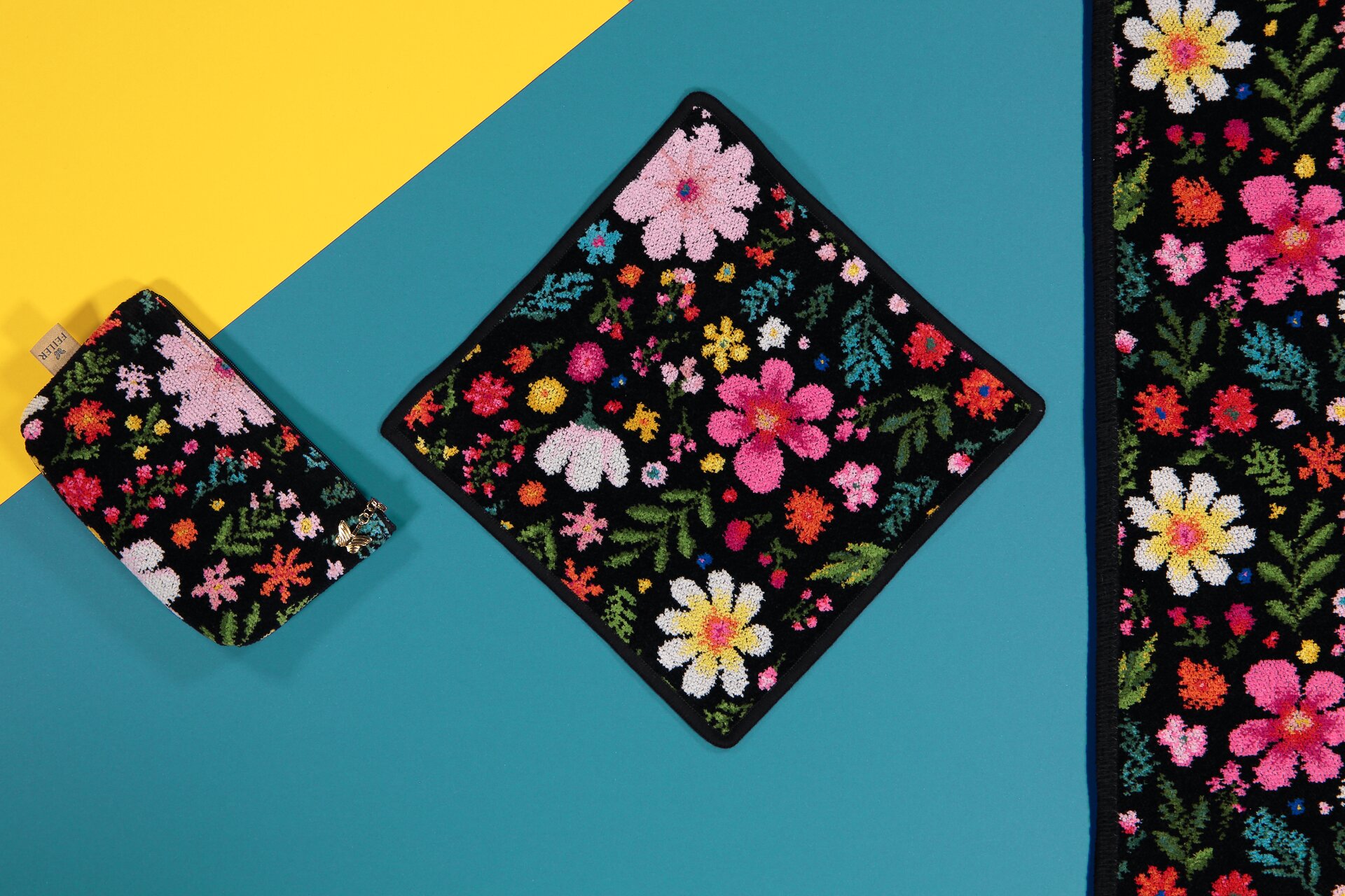 Stilvolle Chenille-Set mit floralen Akzenten – Luxuriöses FEILER Handtuch der Kollektion FLOWER POWER als Lifestyleaufnahme aus Original FEILER-Chenille, Made in Germany.
