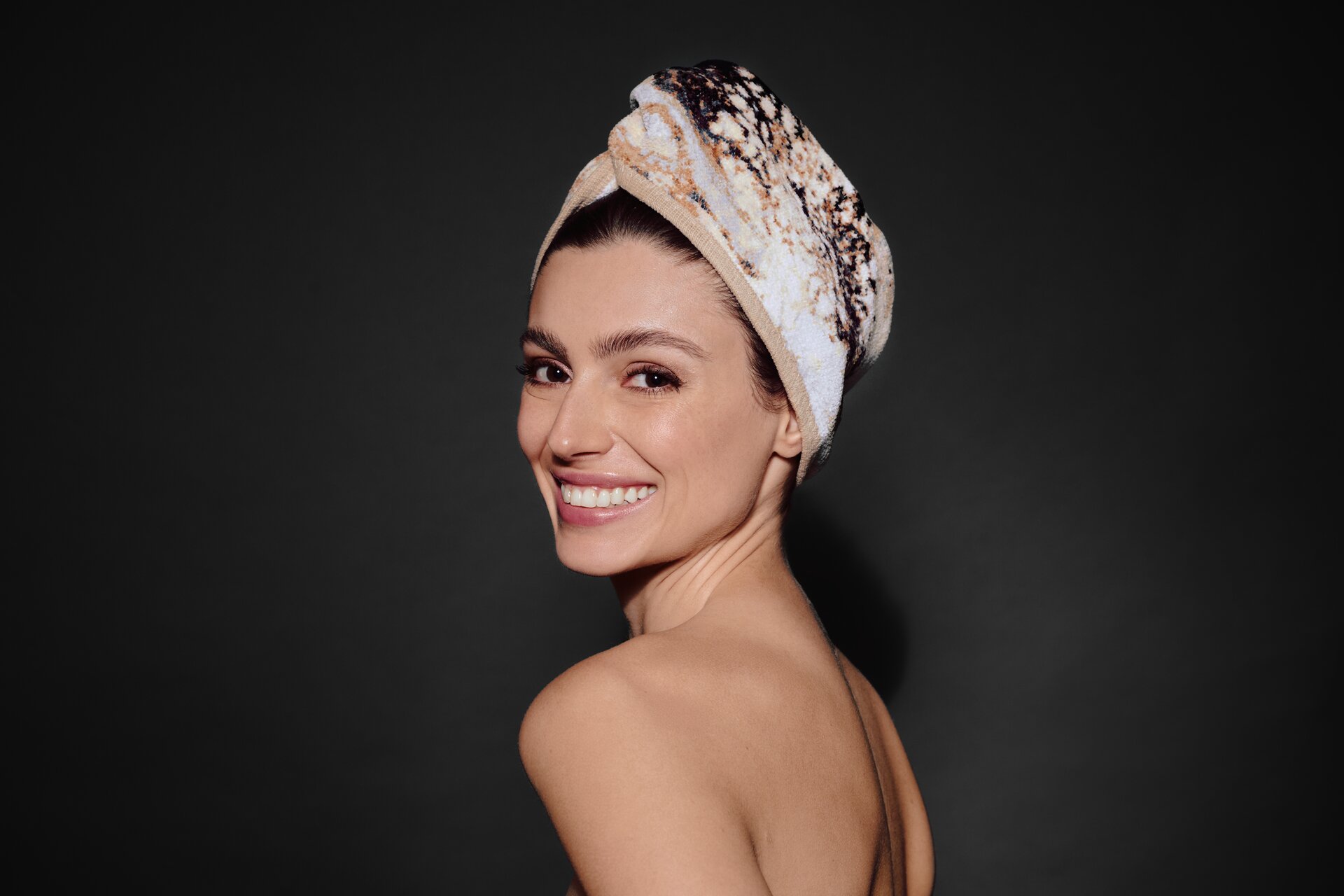 Lifestyle view featuring the FEILER Hand Towel Turban from the PETRICHOR collection, made from Original FEILER chenille in Germany, lifestyle image 2.